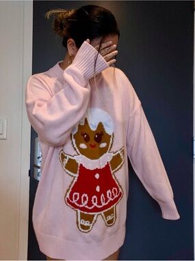 Cozy Pink Gingerbread Graphic Sweater